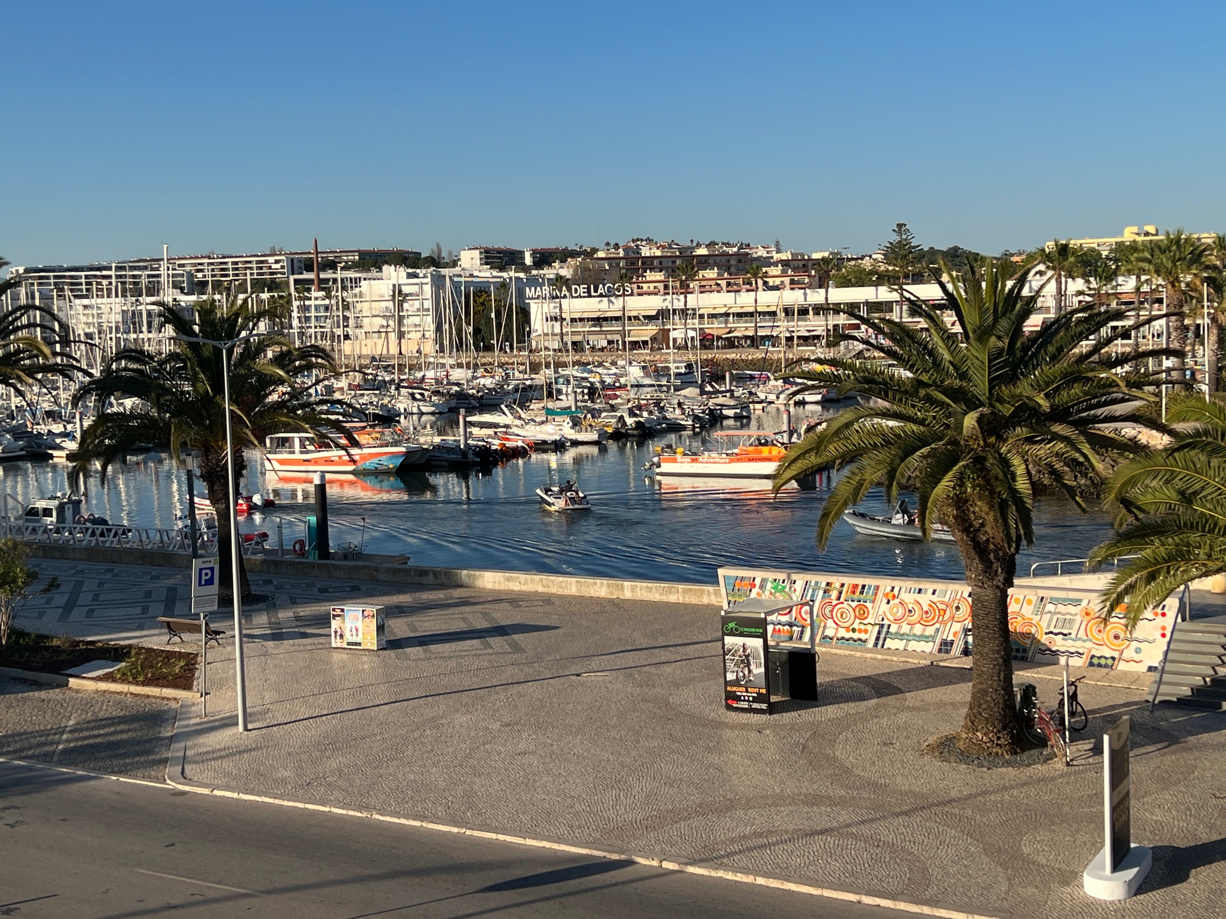 The Lagos marina with several boats moored in slips.