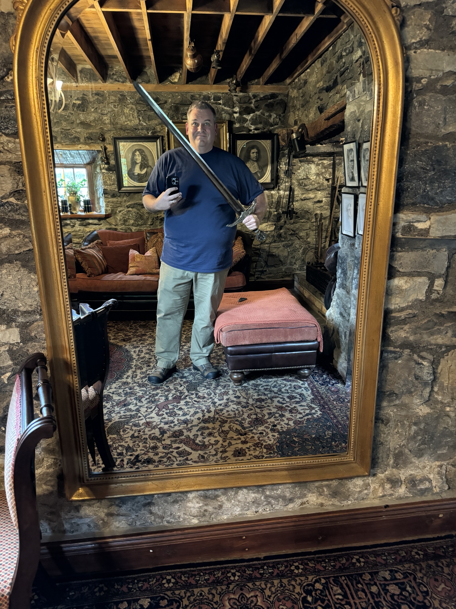 Me posing with a very realistic sword. It looks like it could be a prop from Lord of the Rings. Very heavy. Very steel. Very pointy. Moderately sharp. You could do some real damage with this thing.